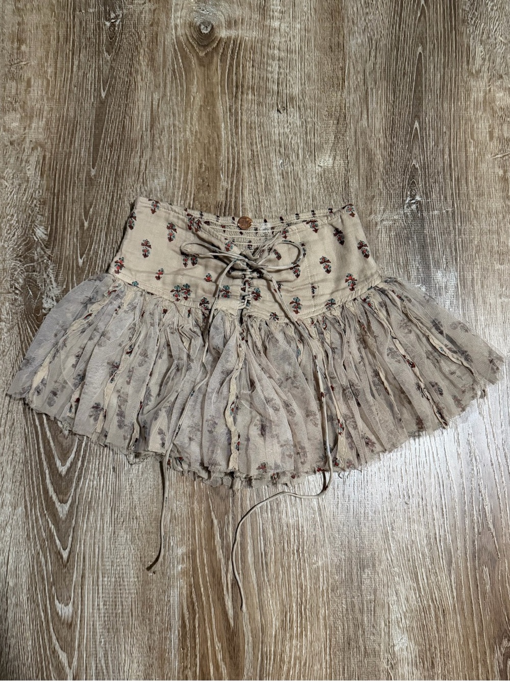 Free People Floral Mini Skirt with Lace detail and tie waist shorts built in